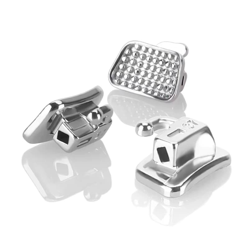 Orthodontic buccal tubes and molar bands