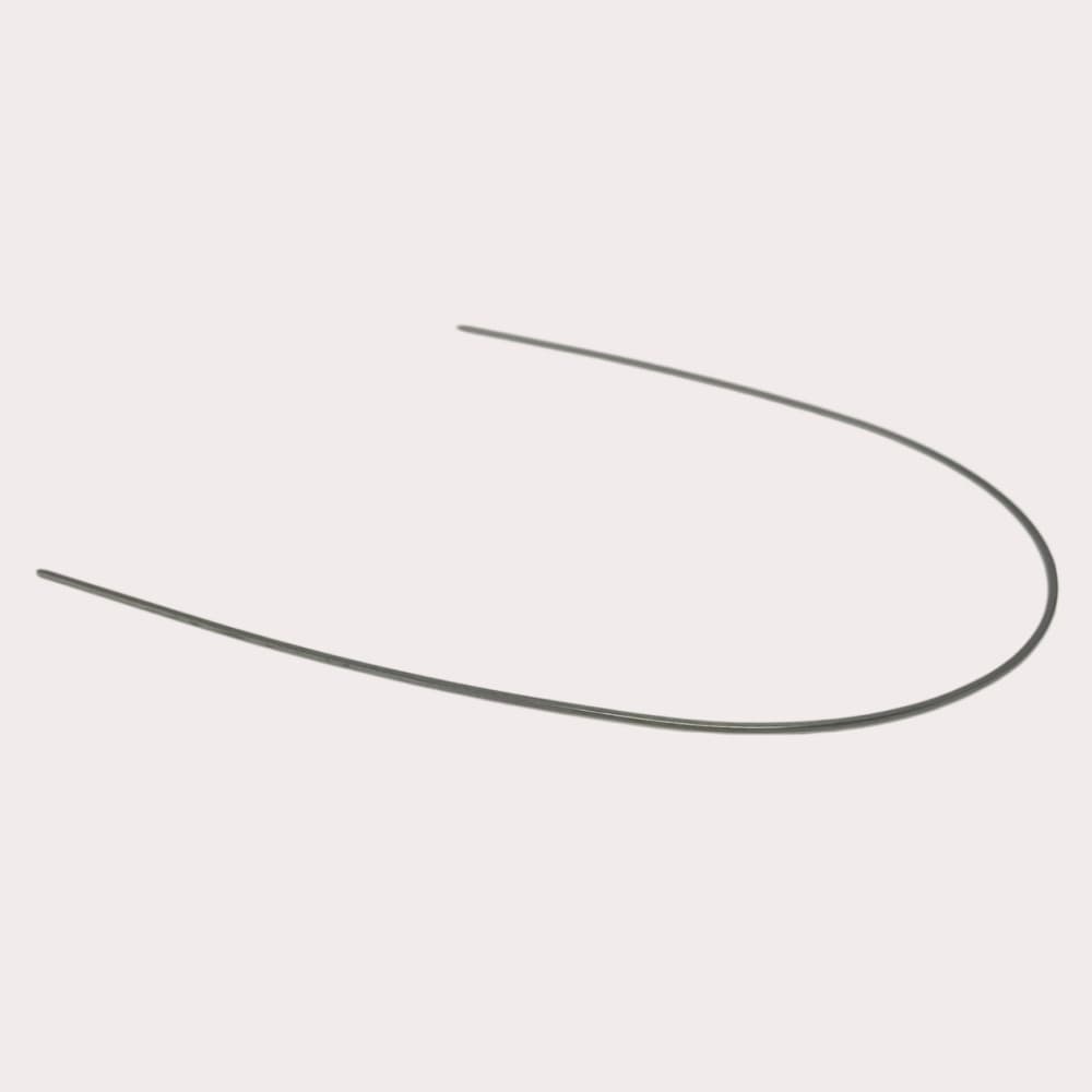 Single polished Copper NiTi orthodontic archwire on a neutral background