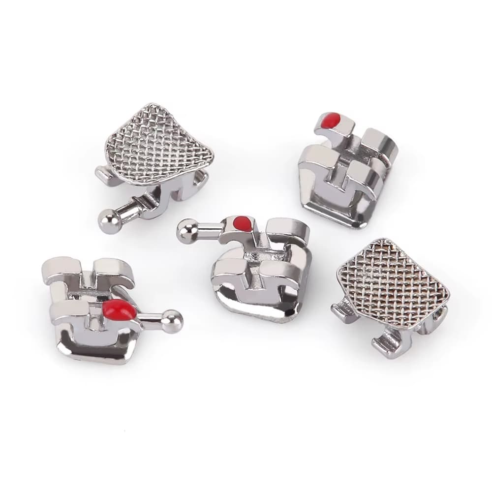 Conventional metal orthodontic brackets showing front, side and mesh base views