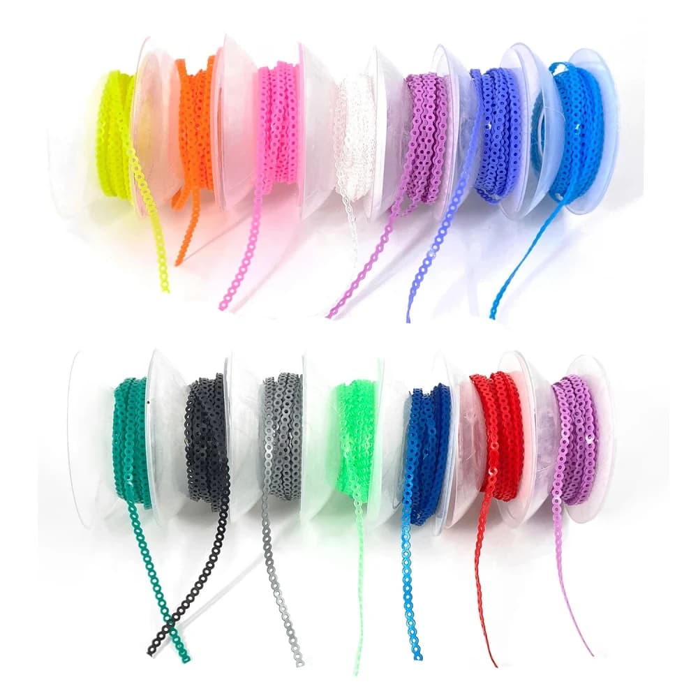 Continuous orthodontic power chain rolls in multiple standard colors