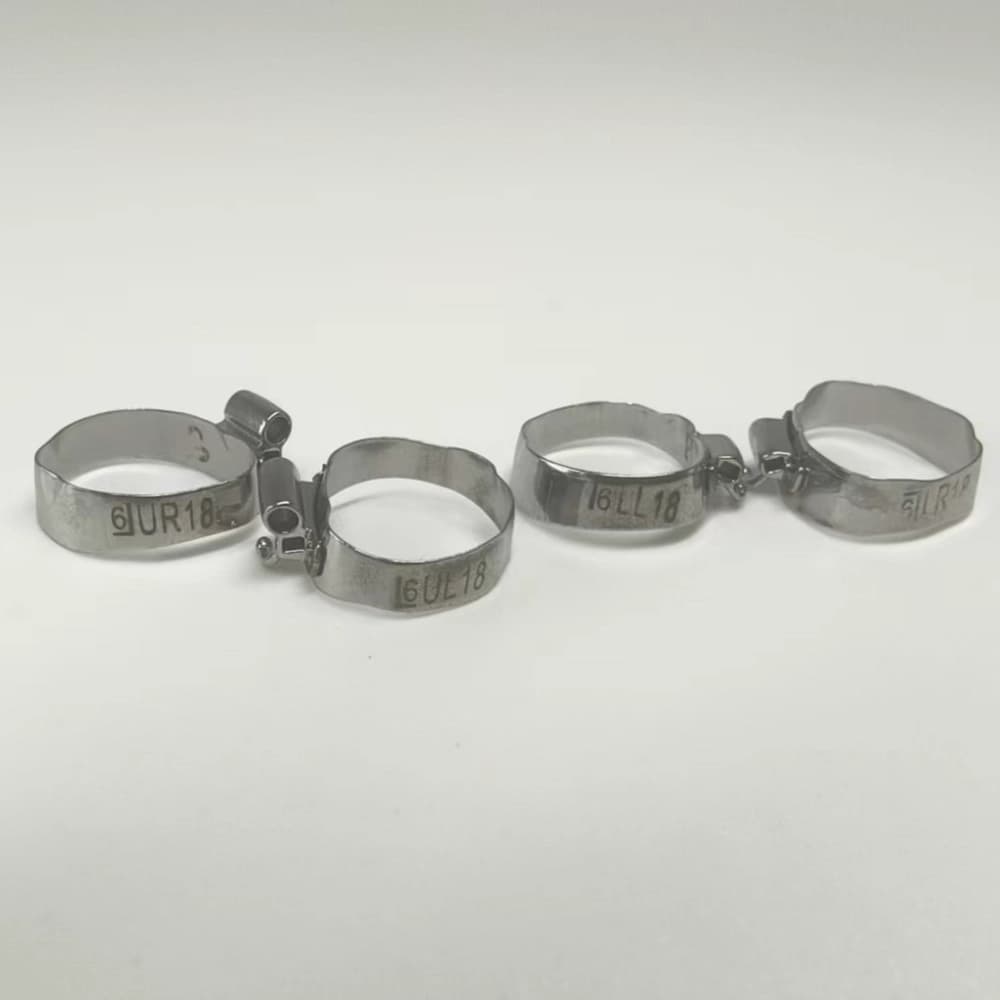 Prewelded orthodontic first molar bands for upper right, upper left, lower right and lower left quadrants