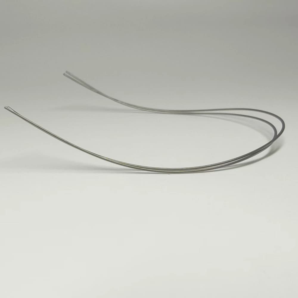 Pair of reverse curve of Spee archwires showing the preformed profile