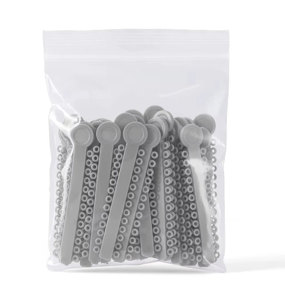 Single-color orthodontic elastic ligature ties in bag packaging